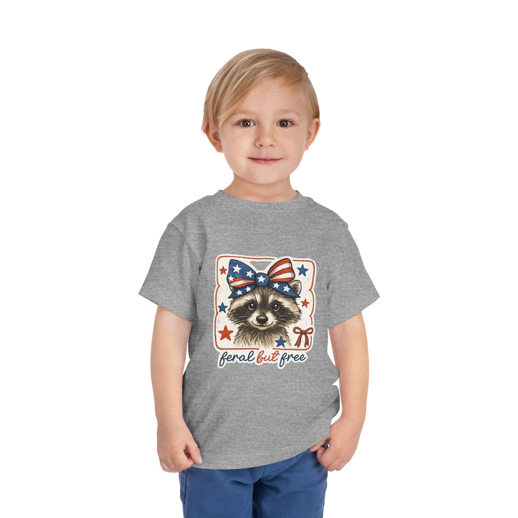 Patriotic Raccoon Toddler Tee — "Feral but Free" 4th of July Shirt